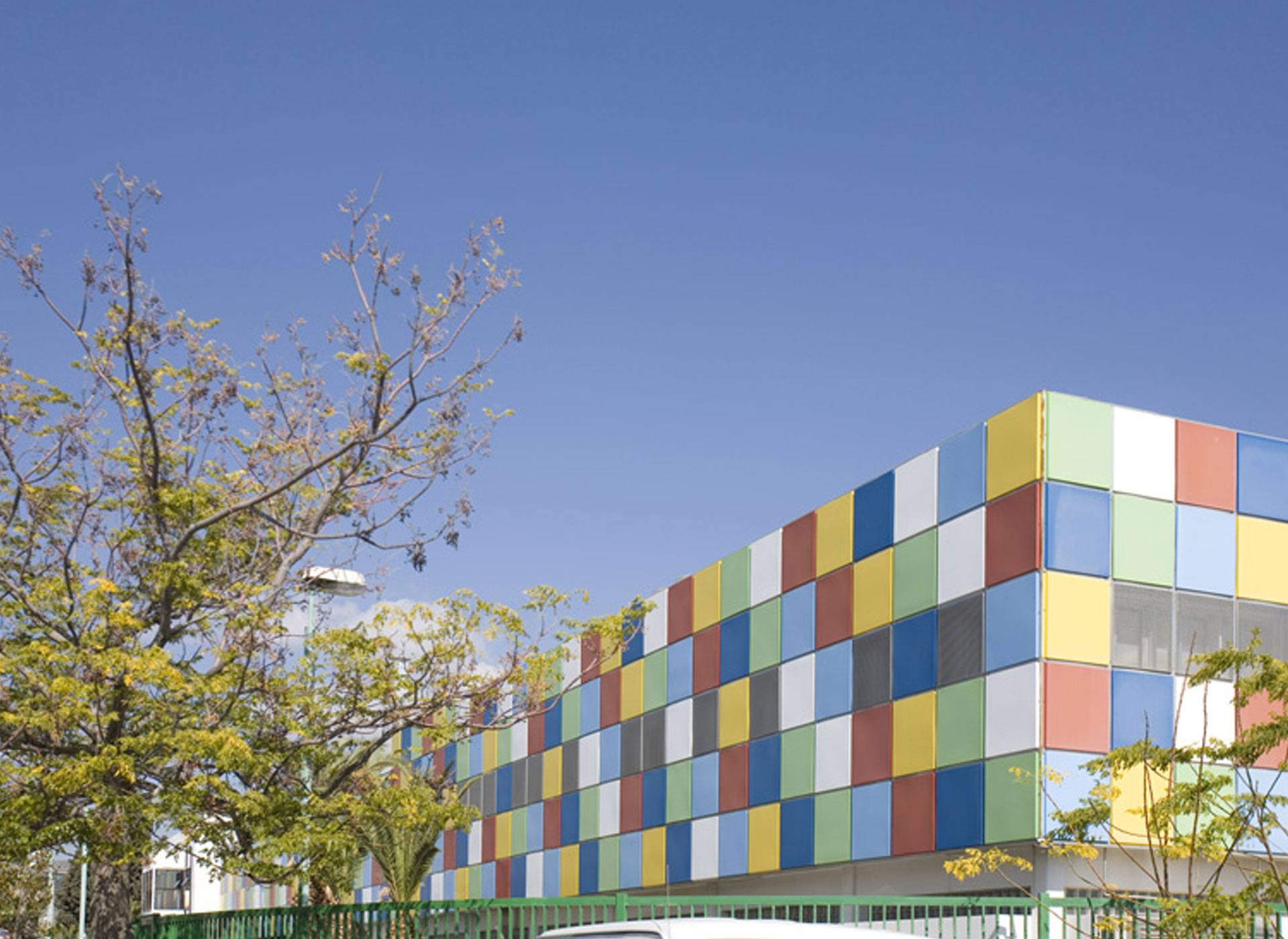 Pharmaceutical manufacturing facility with a colourful panelled facade